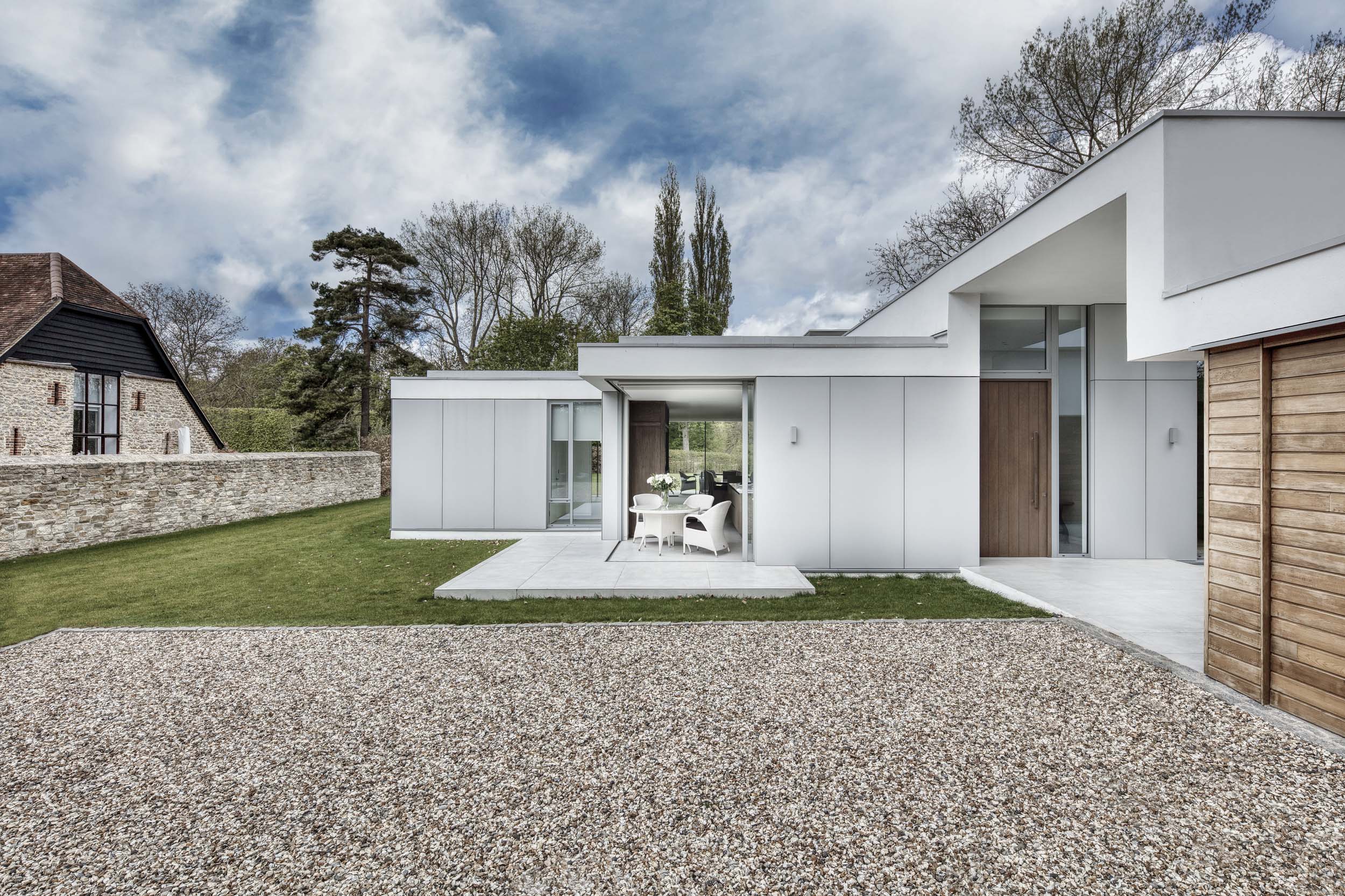 Flowing modern riverside new build set in green belt location