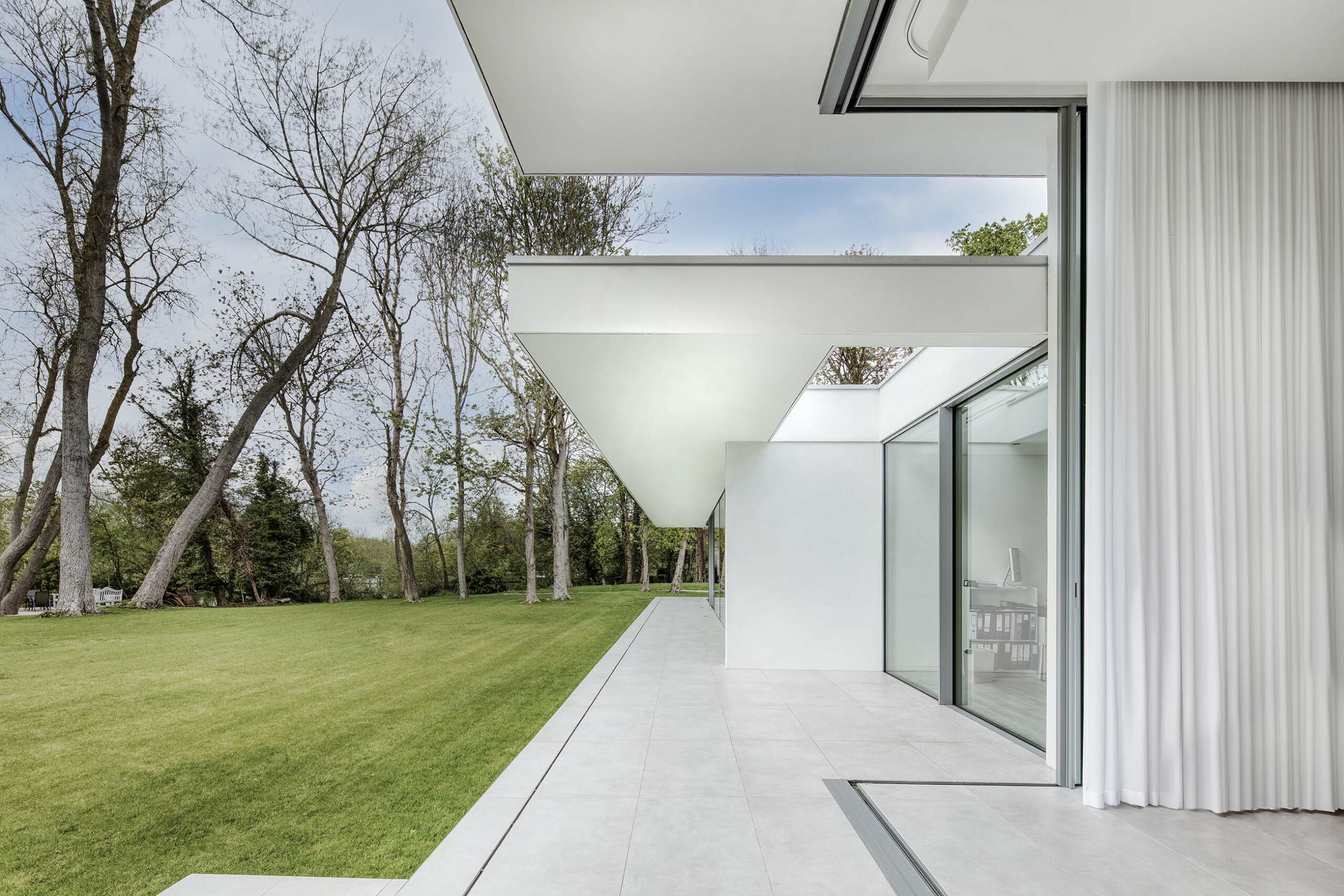 Innovative riverside modern new build home with cantilevered elements