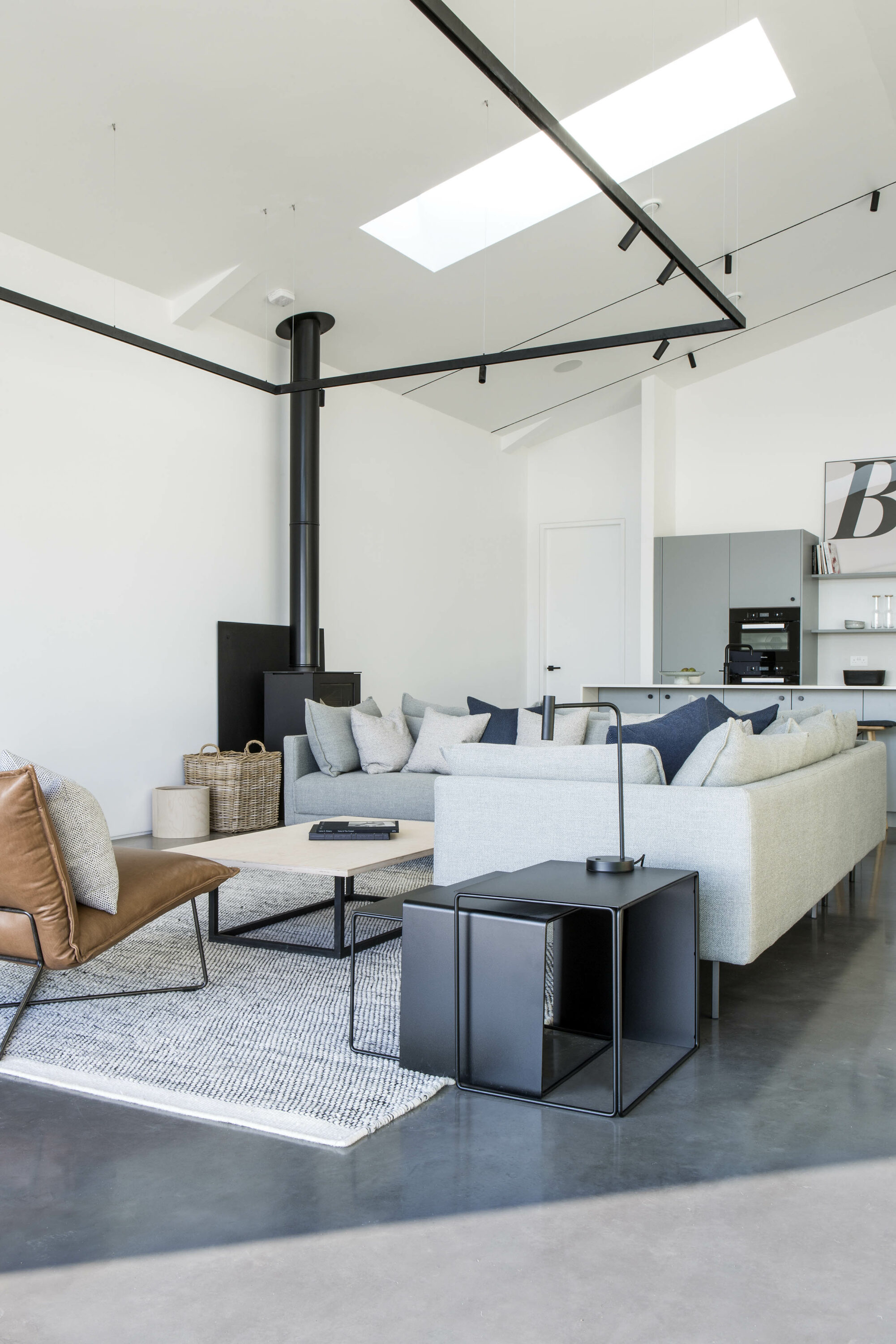 Class Q barn conversion with modern industrial style living spaces interior design