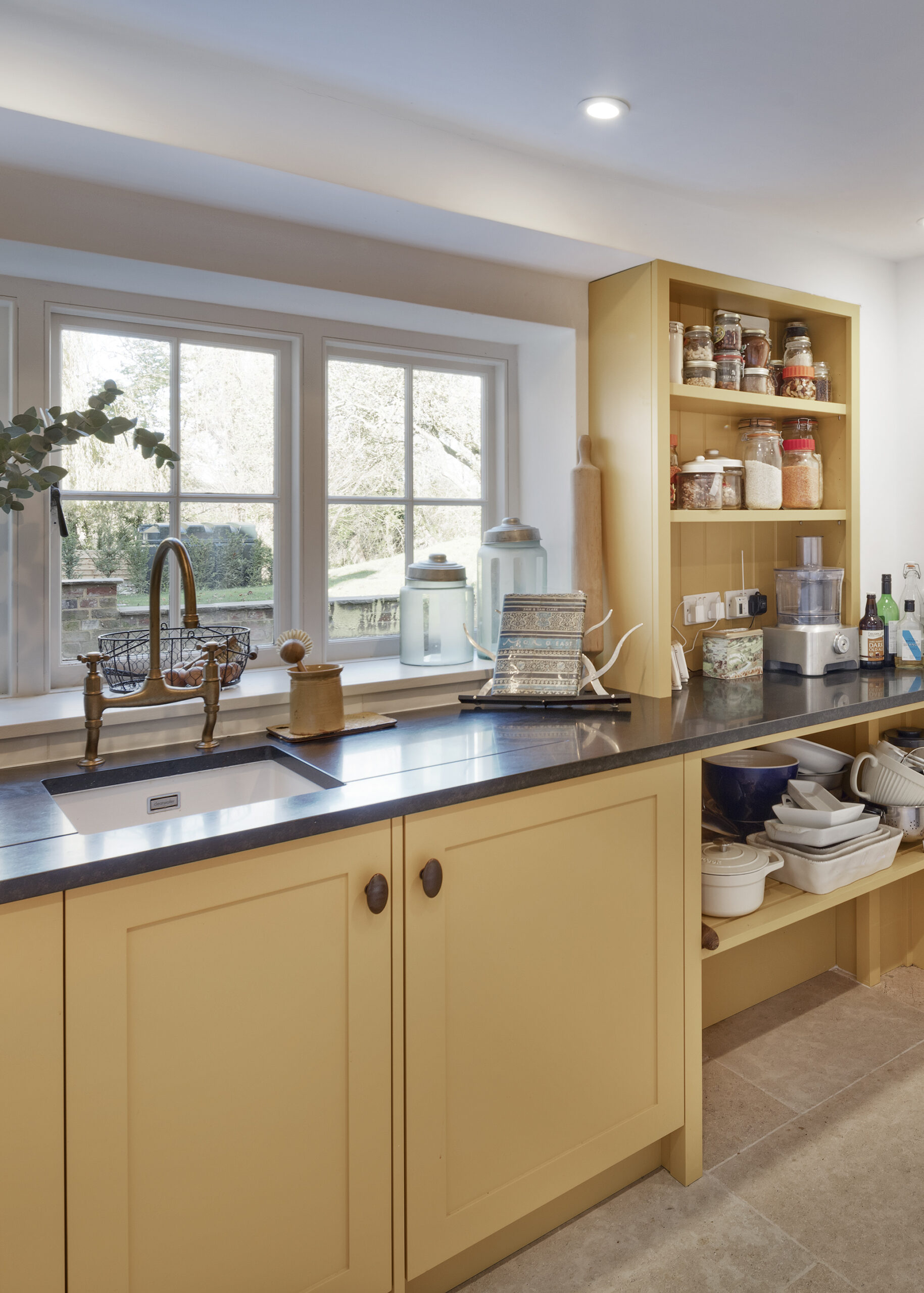 sunny interior design yellow utility room renovation