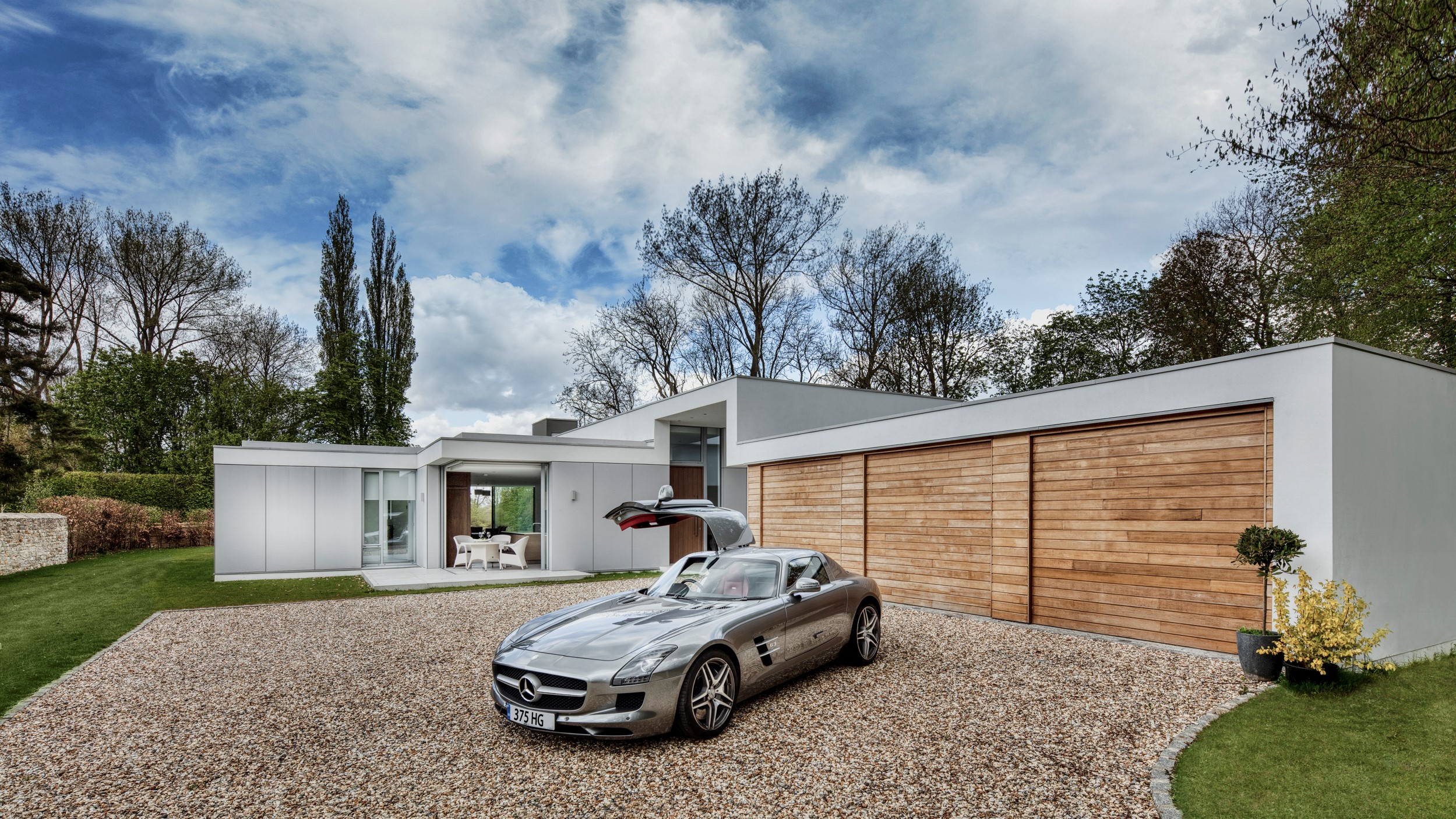 River house contemporary garage new build supercar design