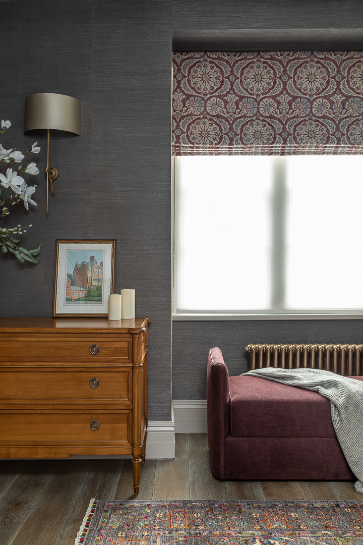 Elegant master bedroom interior design with textured wallpaper and window seat
