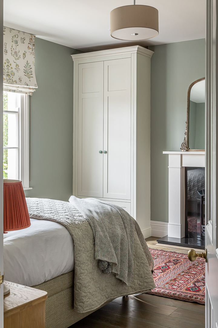 Clean and colourful guest bedroom interior design