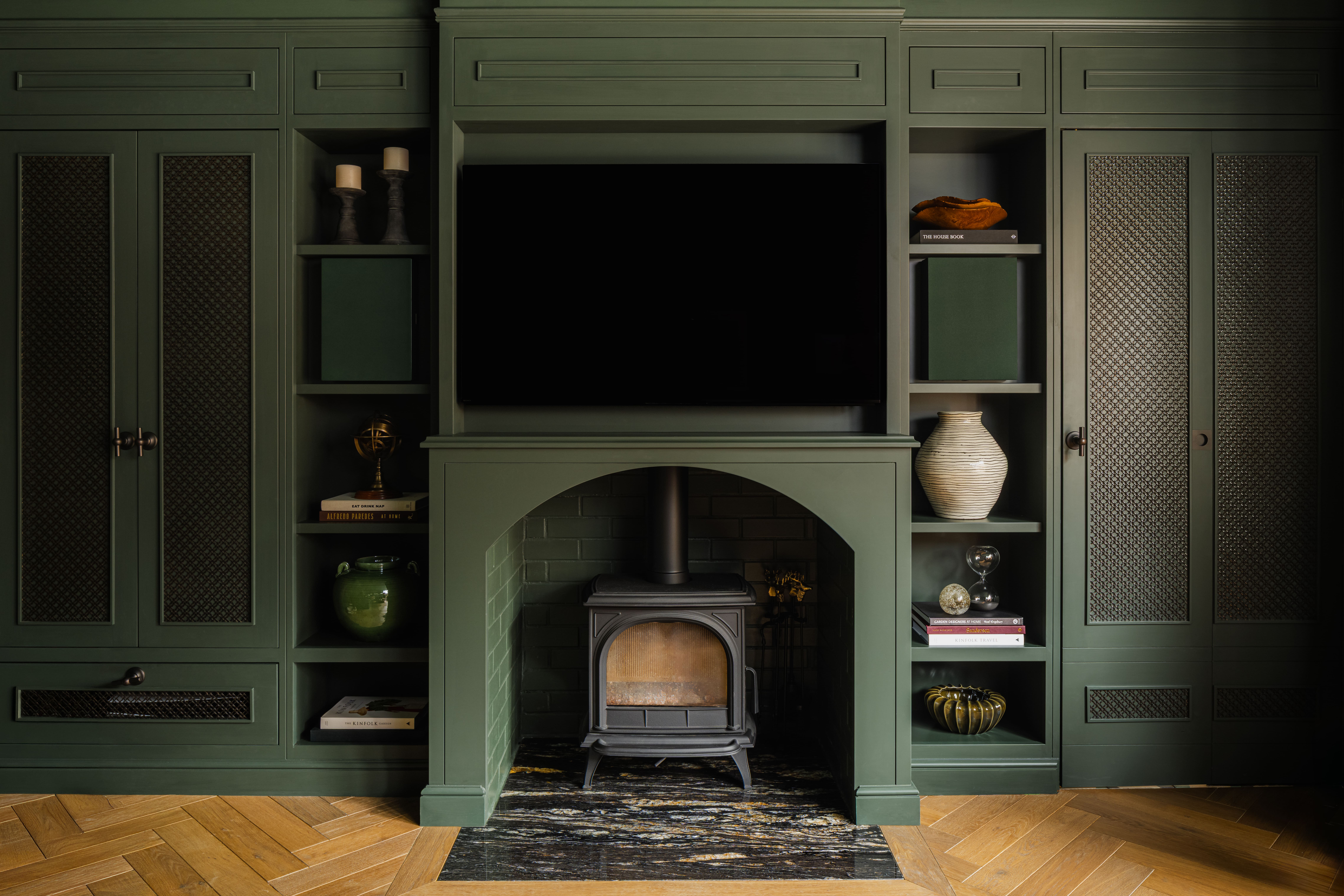 Dark interior snug room designed by HollandGreen