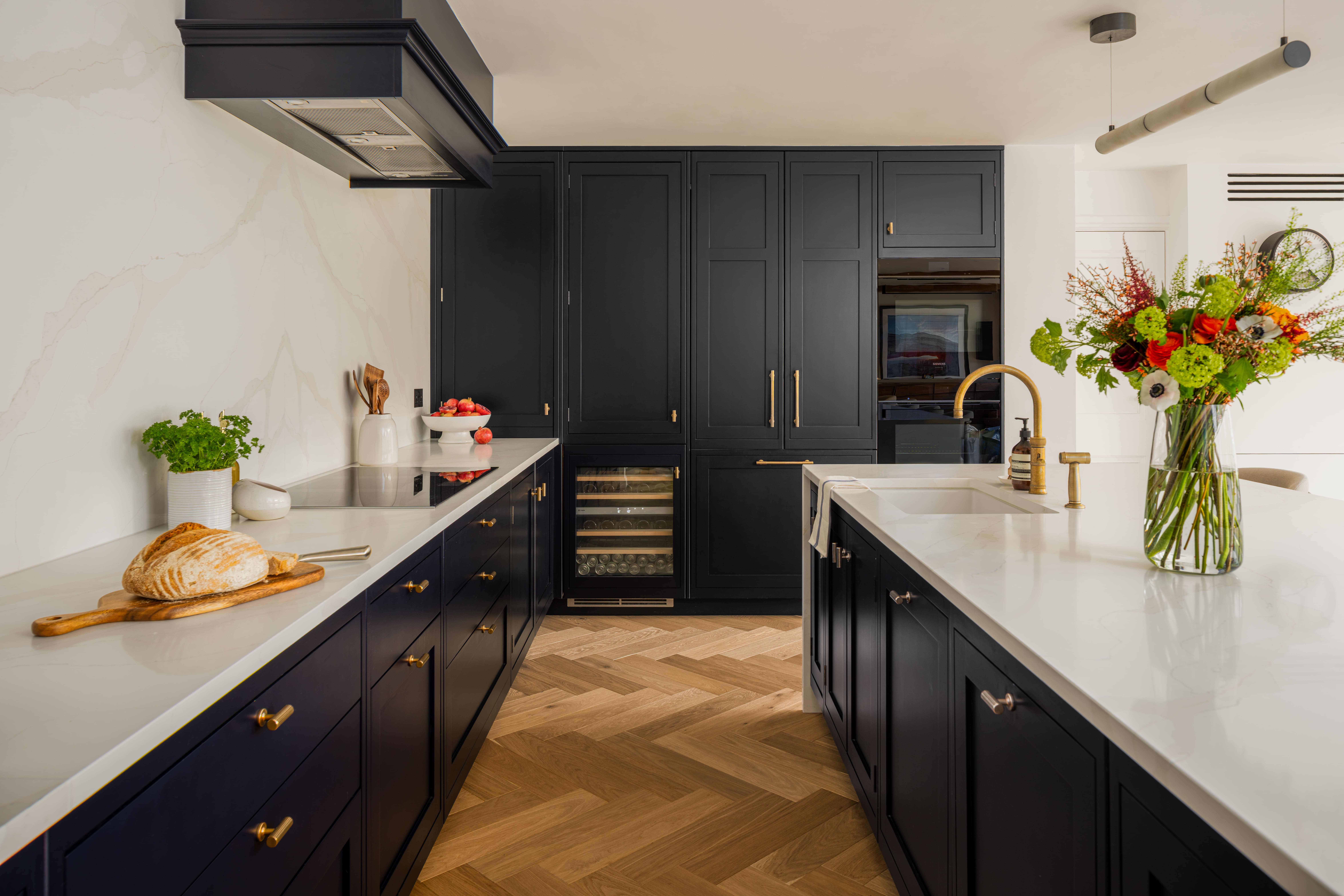 A contemporary, open plan kitchen interior in the Home Counties by HollandGreen